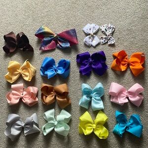 Lots of girls bows and bow holder